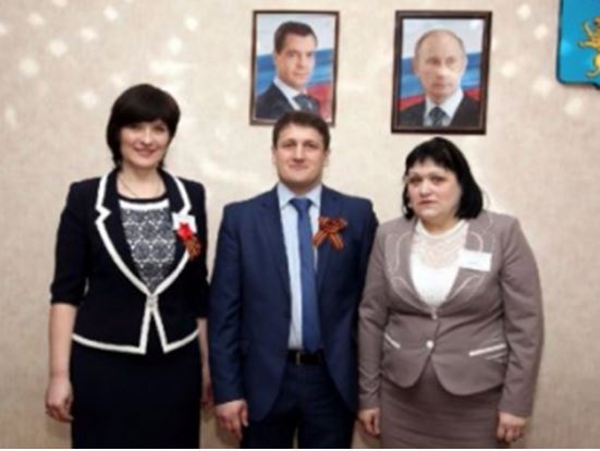 Харьковским учителям грозит увольнение за фото с Путиным