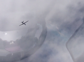 Российский пилот в небе над Сирией заснял на видео американский беспилотник