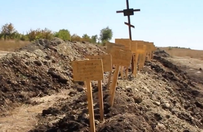 Ополченцы ДНР нашли в стихийных захоронениях 350 тел мирных жителей